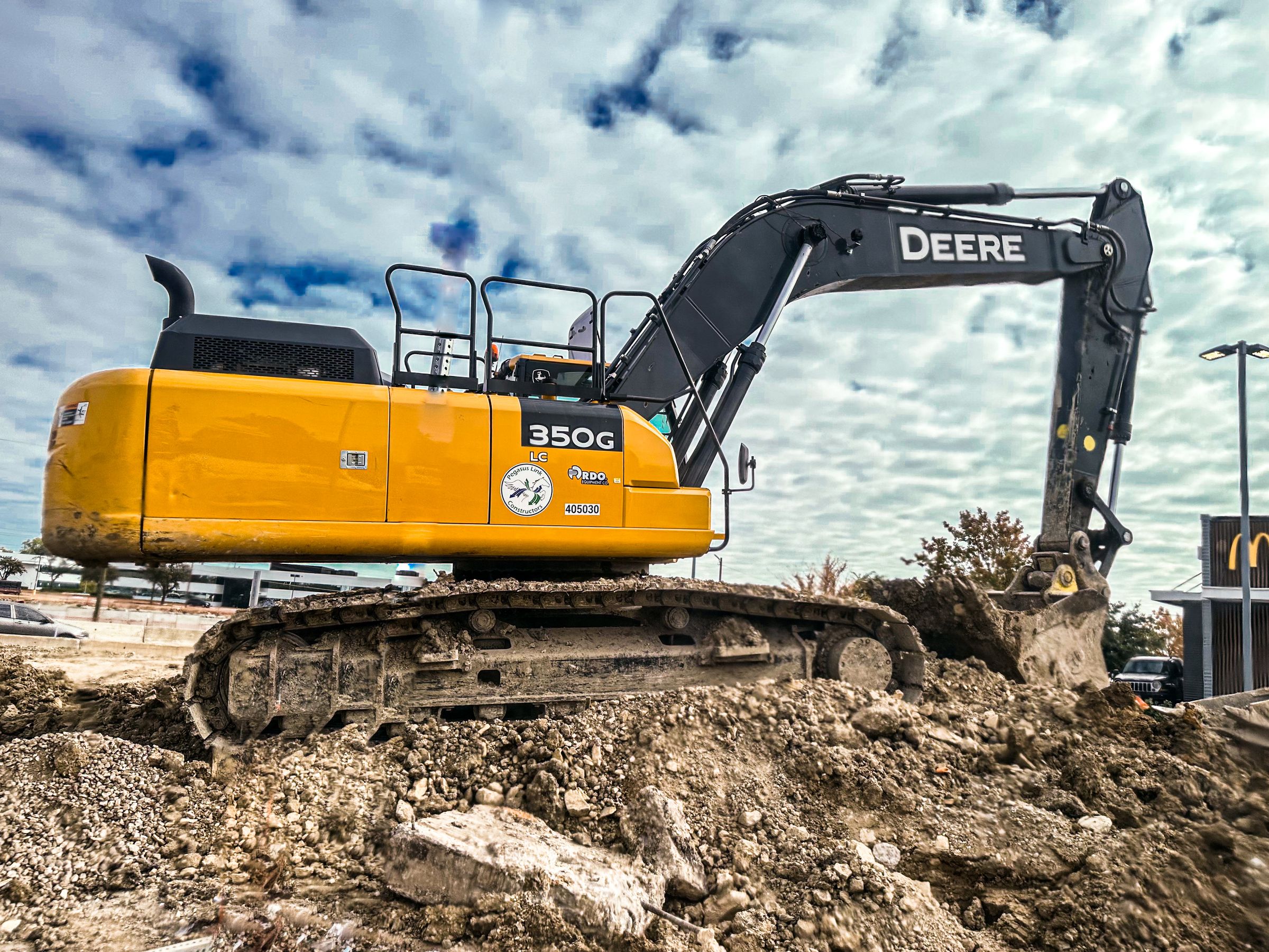 Excavator at an urban construction site